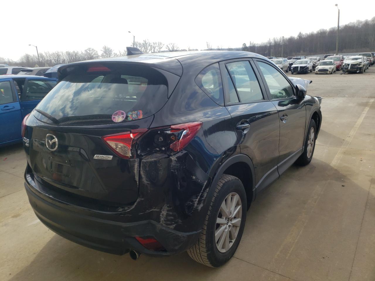 Photo 4 from auction – 2014 MAZDA CX-5 SPORT with VIN JM3KE4BE6E0389302