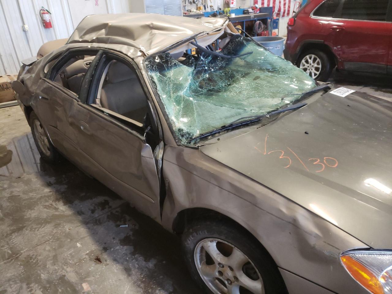 Photo 9 from auction – 2004 FORD TAURUS SES with VIN 1FAFP55U64G105238