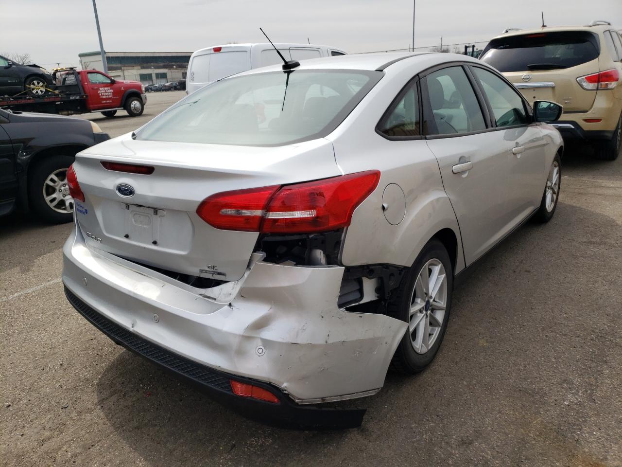 Photo 4 from auction – 2016 FORD FOCUS SE with VIN 1FADP3F21GL305402