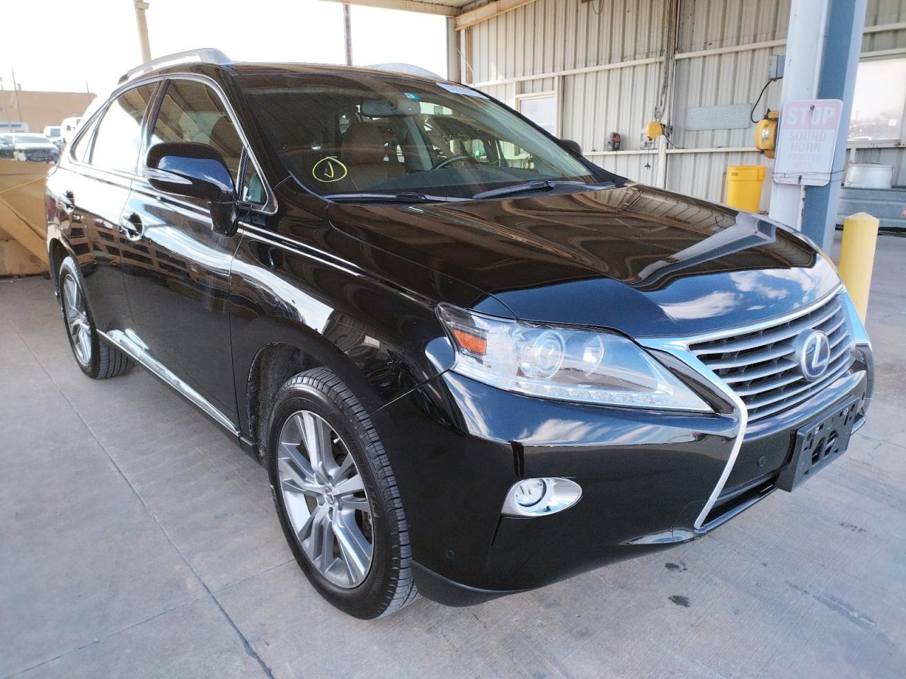 LEXUS RX 450H 2015 with VIN 2T2BC1BA3FC001584 - Photo from auction
