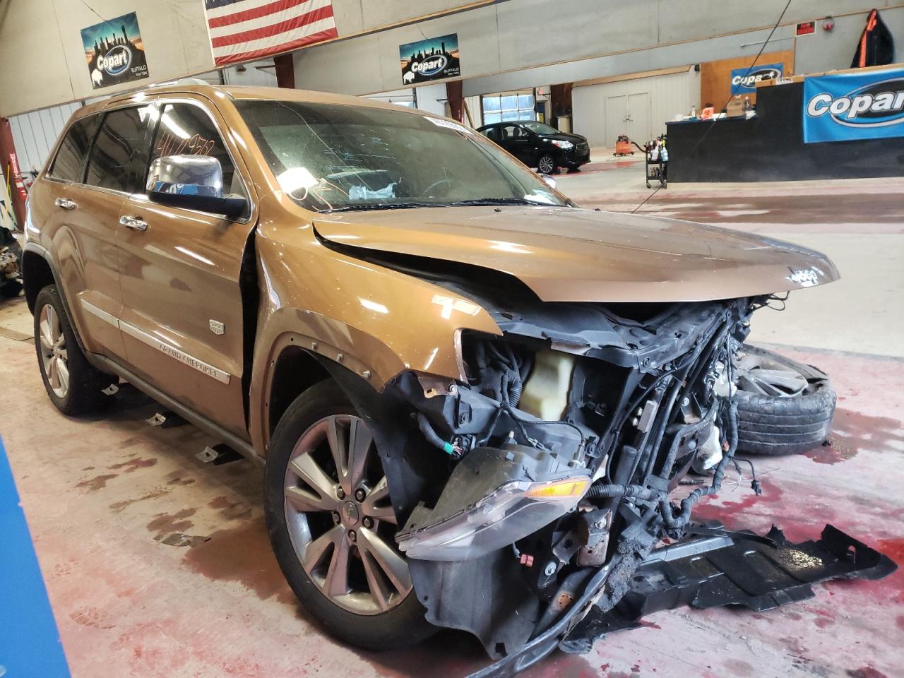 JEEP GRAND CHER 2011 with VIN 1J4RR4GG4BC675031 - Photo from auction