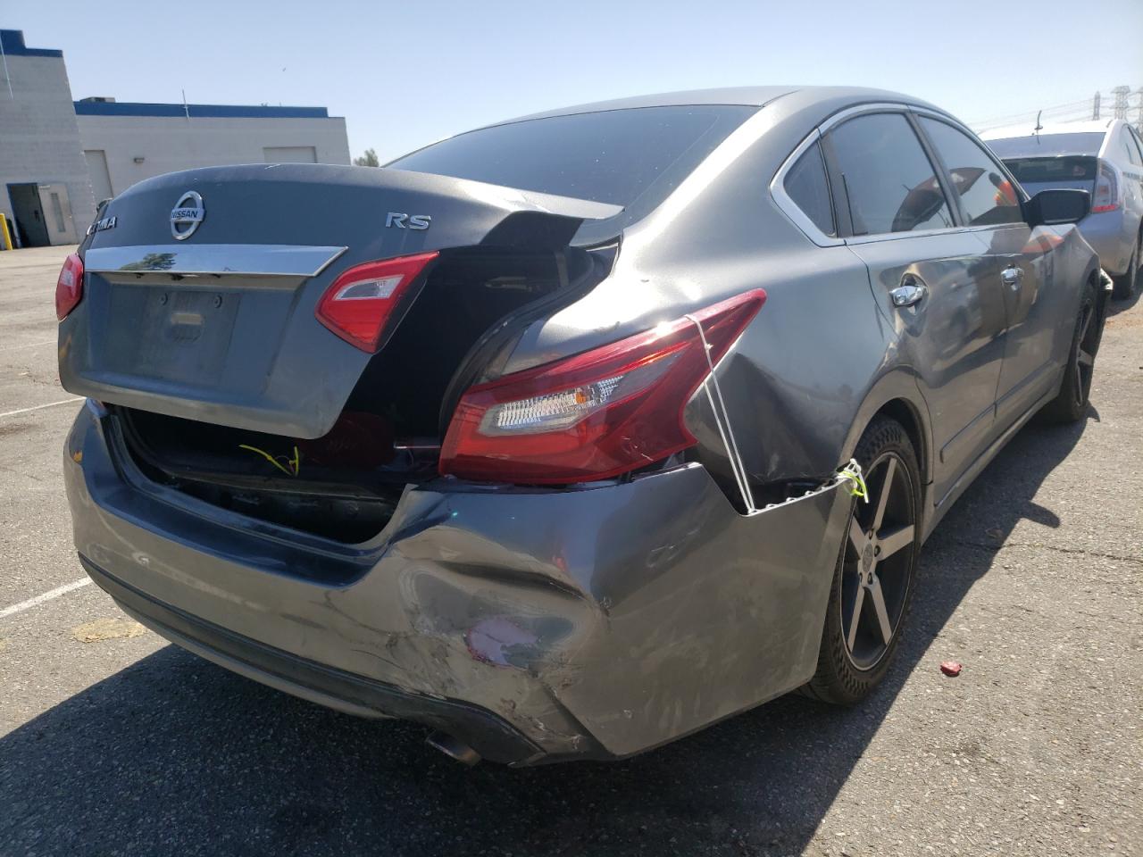 Photo 4 from auction – 2016 NISSAN ALTIMA 2.5 with VIN 1N4AL3AP7GC175675