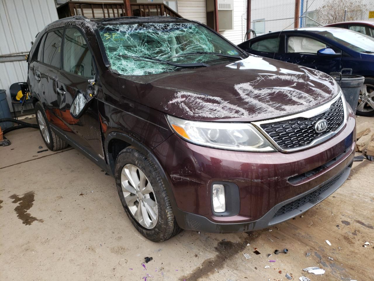 KIA SORENTO EX 2014 with VIN 5XYKUDA77EG497744 - Photo from auction