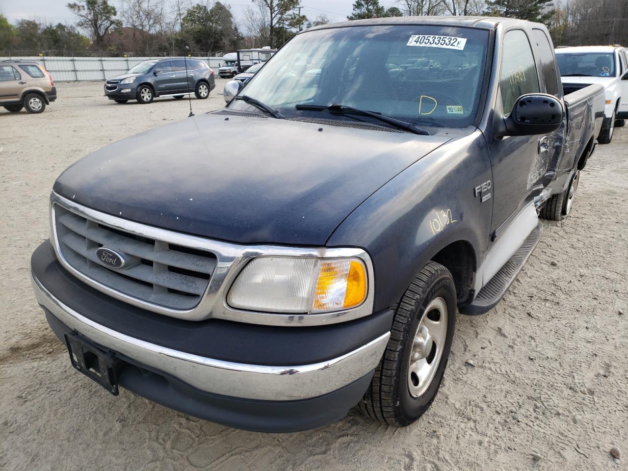 Photo 2 from auction – 2000 FORD F150 with VIN 1FTRX17W3YNA95932