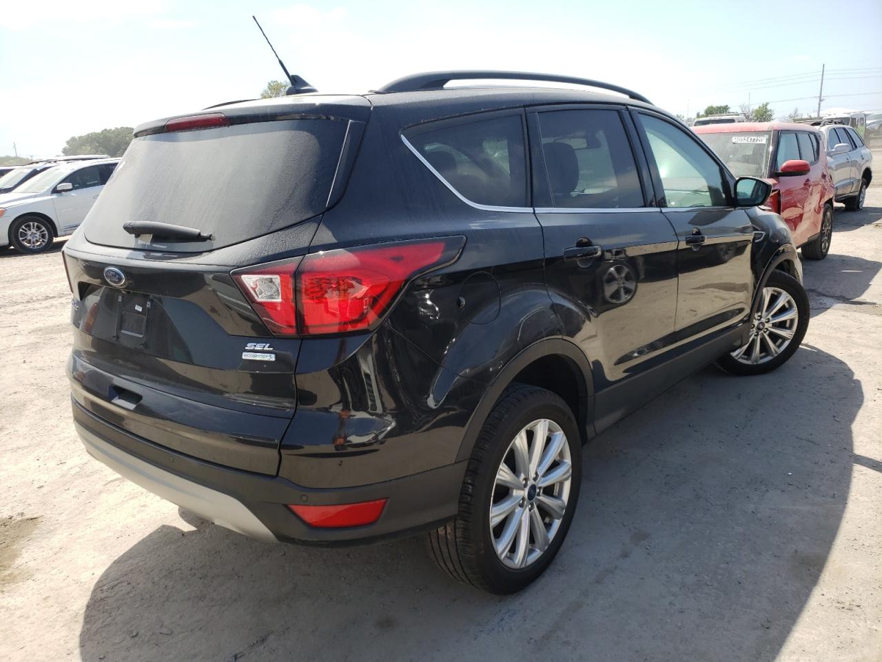 Photo 4 from auction – 2019 FORD ESCAPE SEL with VIN 1FMCU0HD3KUA40377