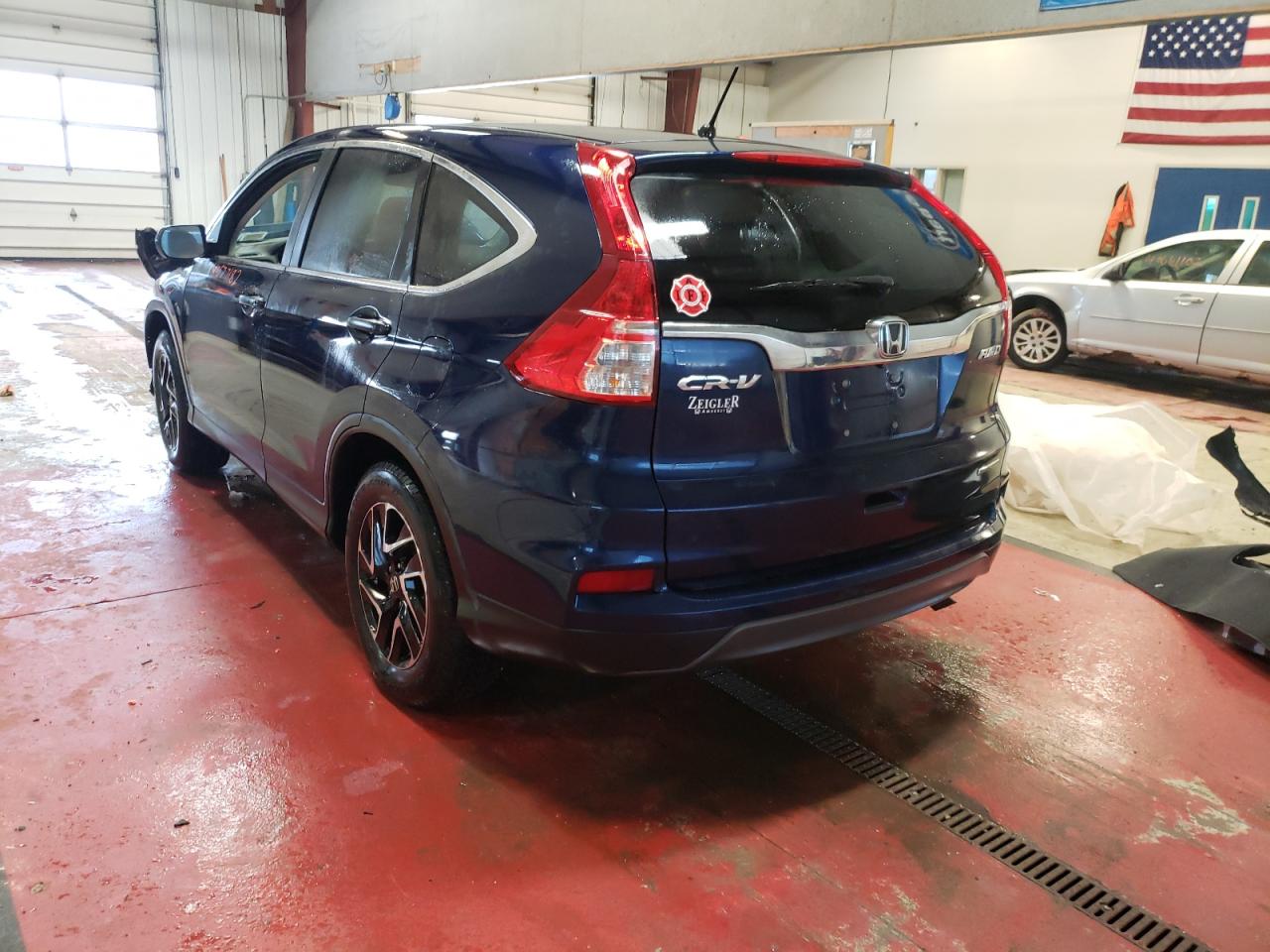 Photo 3 from auction – 2016 HONDA CR-V SE with VIN 5J6RM4H4XGL064883