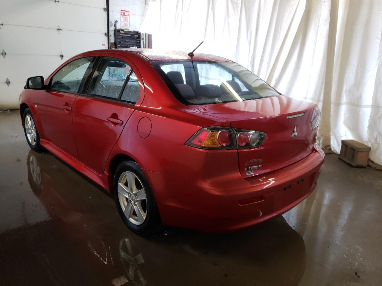 Photo 3 from auction – 2013 MITSUBISHI LANCER SE with VIN JA32V2FW2DU022791