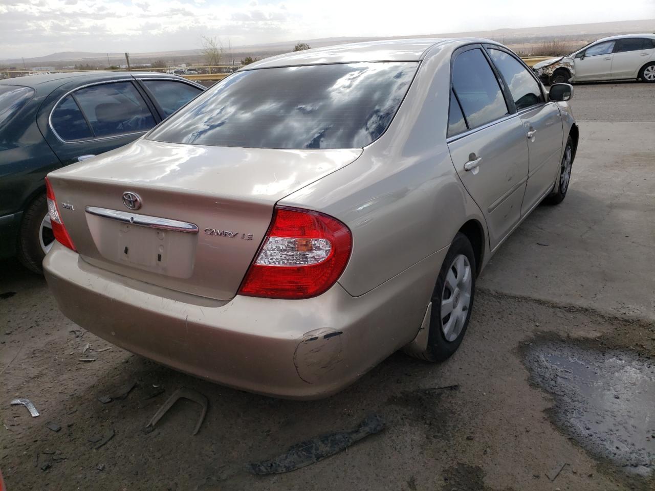 Photo 4 from auction – 2002 TOYOTA CAMRY LE with VIN JTDBE32K520037400