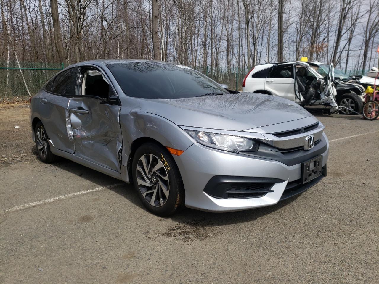HONDA CIVIC EX 2017 with VIN 19XFC2F78HE219566 - Photo from auction