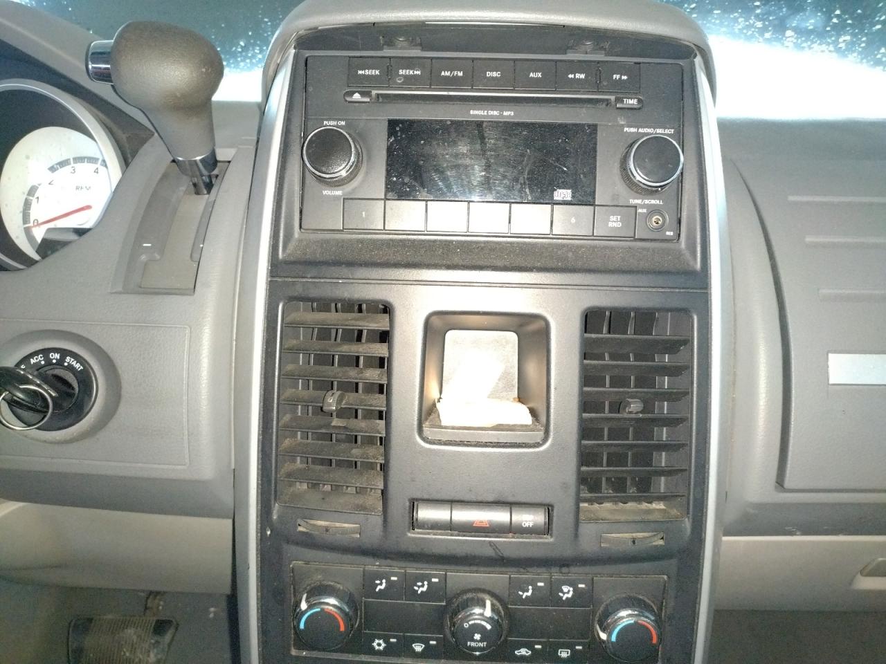 Photo 9 from auction – 2010 DODGE GRAND CARA with VIN 2D4RN4DE3AR467218