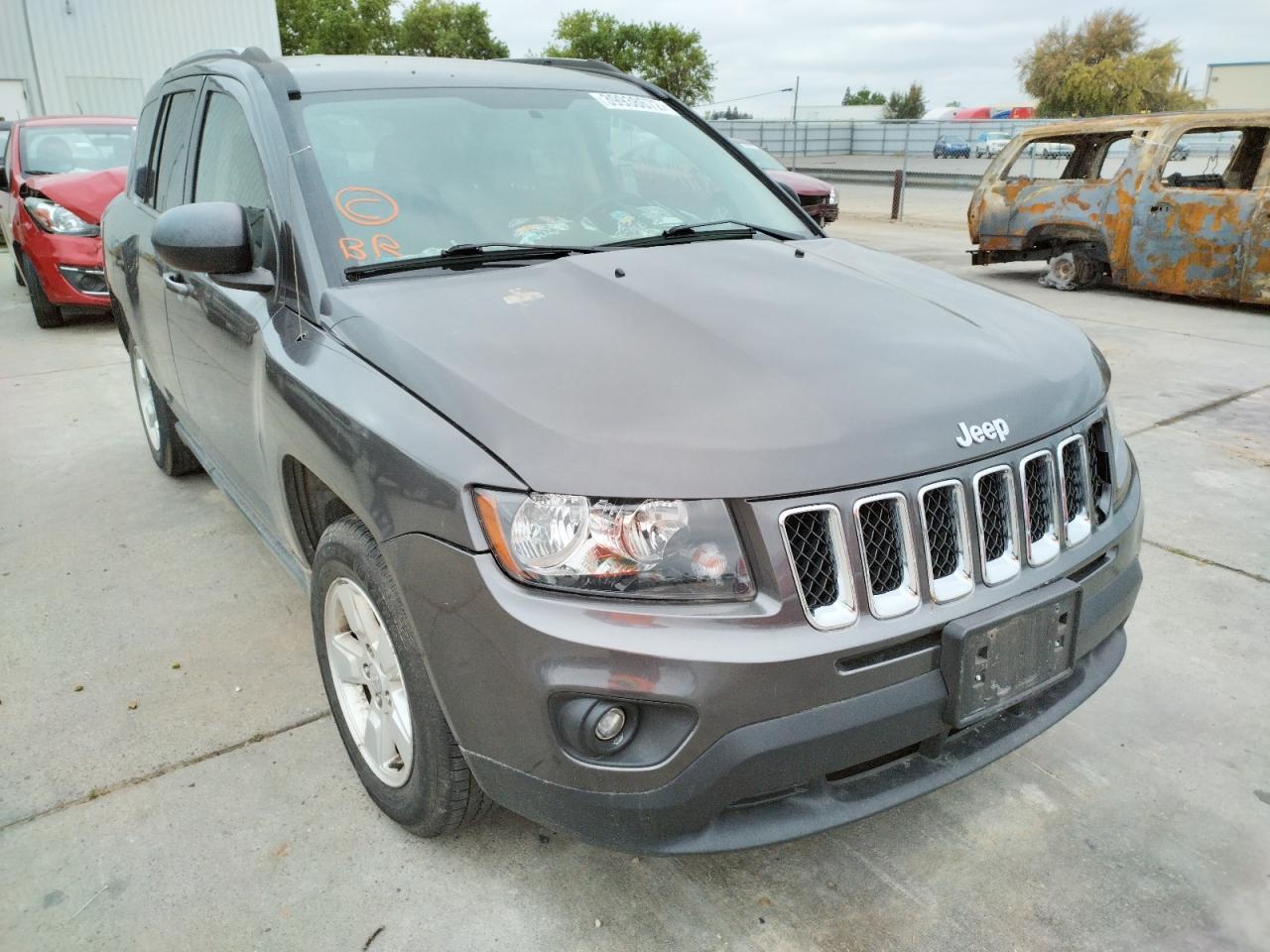 JEEP COMPASS SP 2014 with VIN 1C4NJCBA5ED789143 - Photo from auction