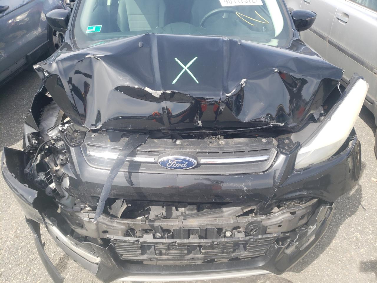 Photo 7 from auction – 2016 FORD ESCAPE SE with VIN 1FMCU9GX9GUA48359