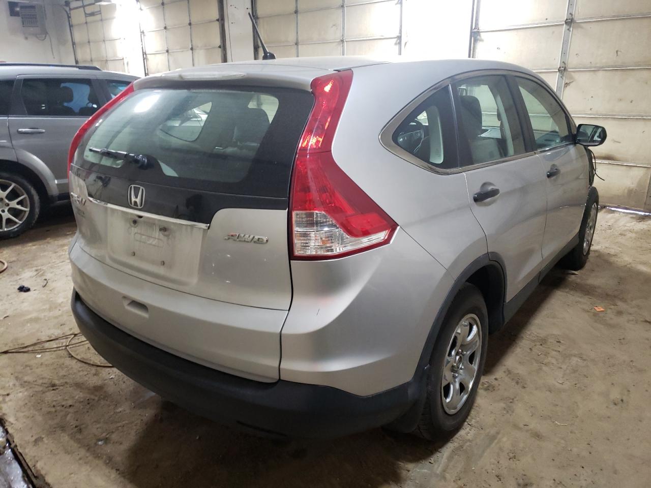 Photo 4 from auction – 2014 HONDA CR-V LX with VIN 5J6RM4H31EL094830