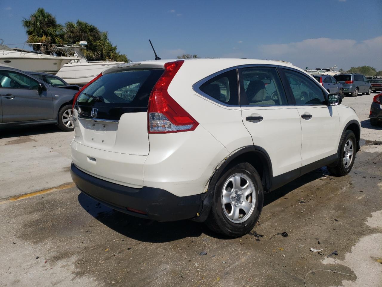 Photo 4 from auction – 2013 HONDA CR-V LX with VIN 5J6RM3H30DL024910