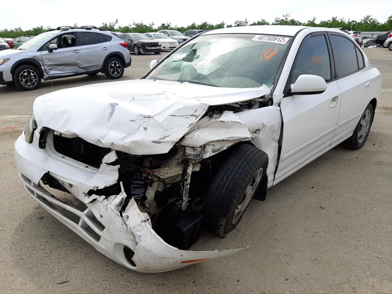 Photo 2 from auction – 2003 HYUNDAI ELANTRA GL with VIN KMHDN45D93U472289