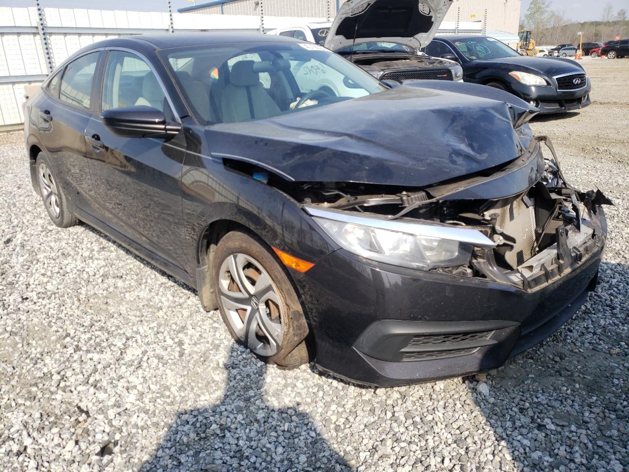 HONDA CIVIC LX 2017 with VIN 19XFC2F5XHE025412 - Photo from auction