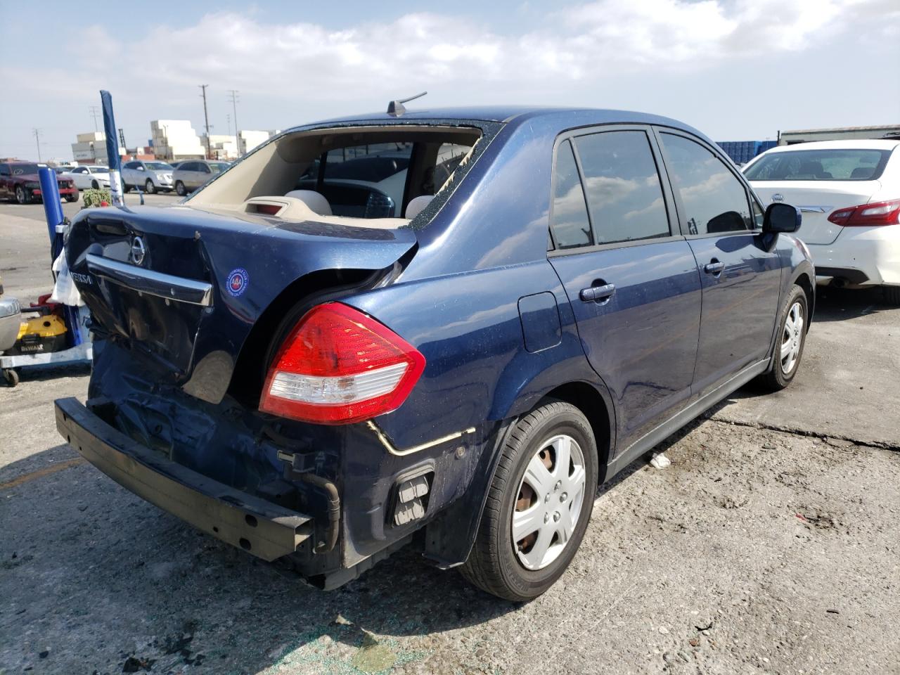 Photo 4 from auction – 2009 NISSAN VERSA S with VIN 3N1BC11E19L443177