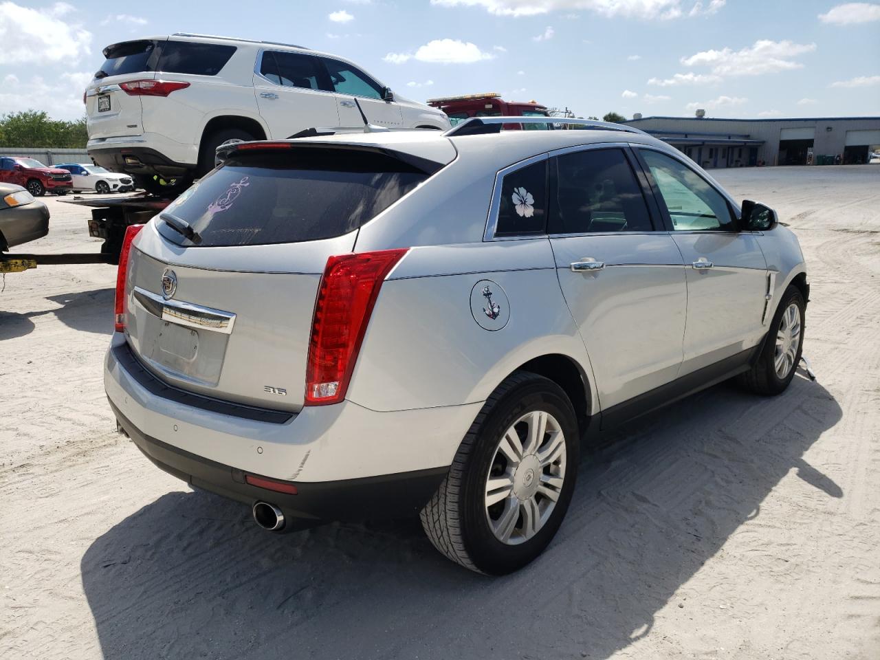 Photo 4 from auction – 2012 CADILLAC SRX LUXURY with VIN 3GYFNAE34CS657914