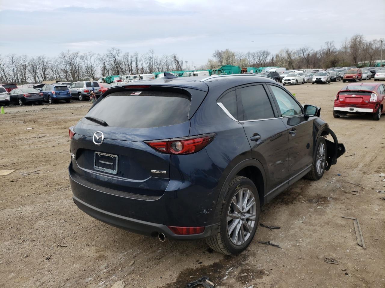 Photo 4 from auction – 2021 MAZDA CX-5 GRAND with VIN JM3KFBDM4M1309669