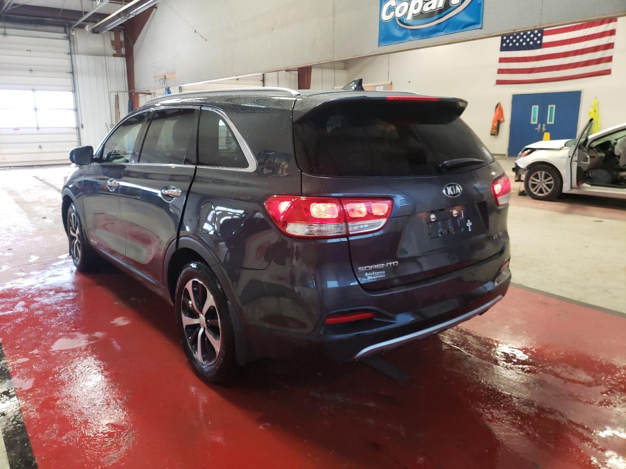 Photo 3 from auction – 2017 KIA SORENTO EX with VIN 5XYPHDA52HG305482