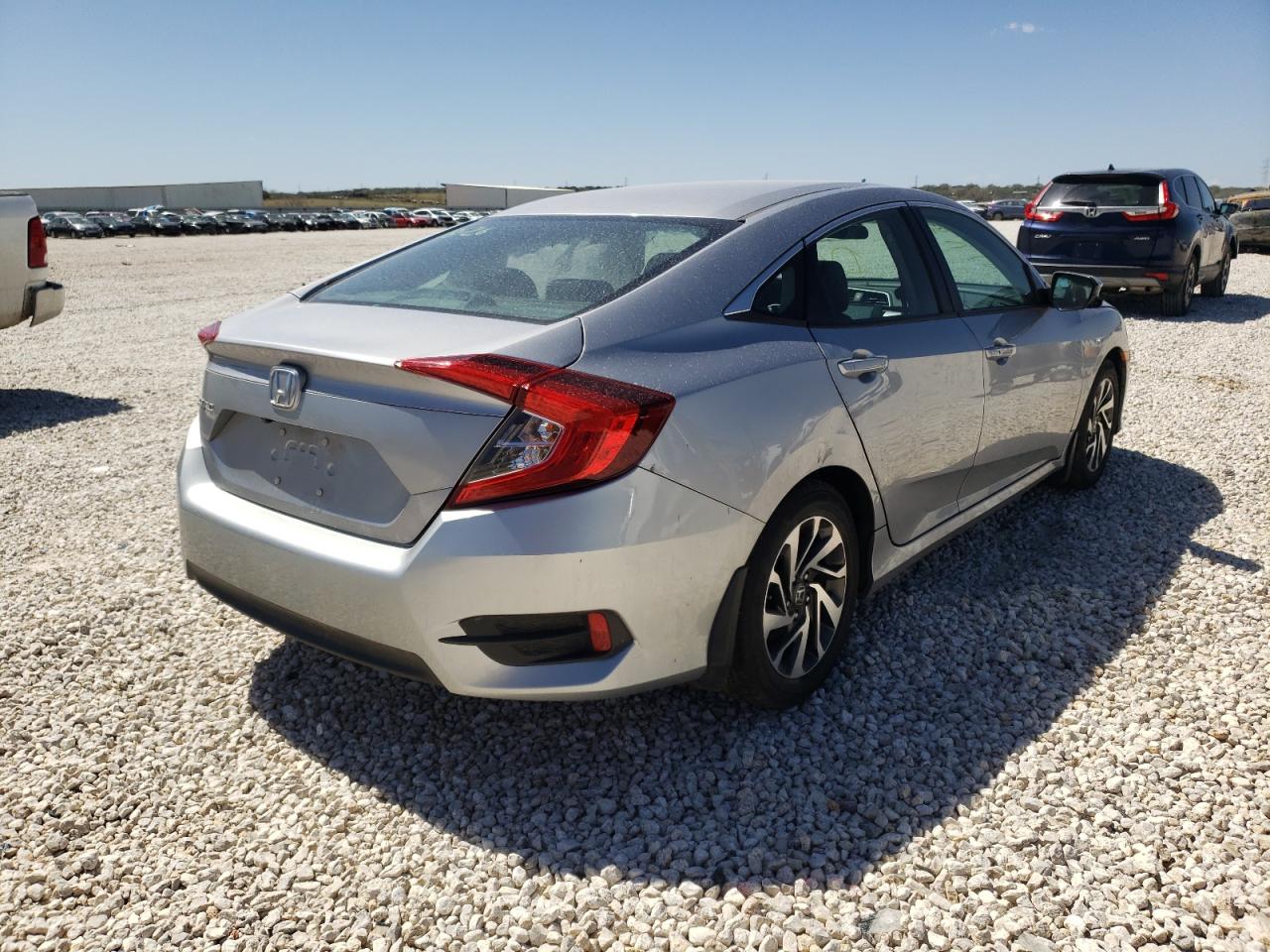 Photo 4 from auction – 2016 HONDA CIVIC EX with VIN 19XFC2F75GE031618