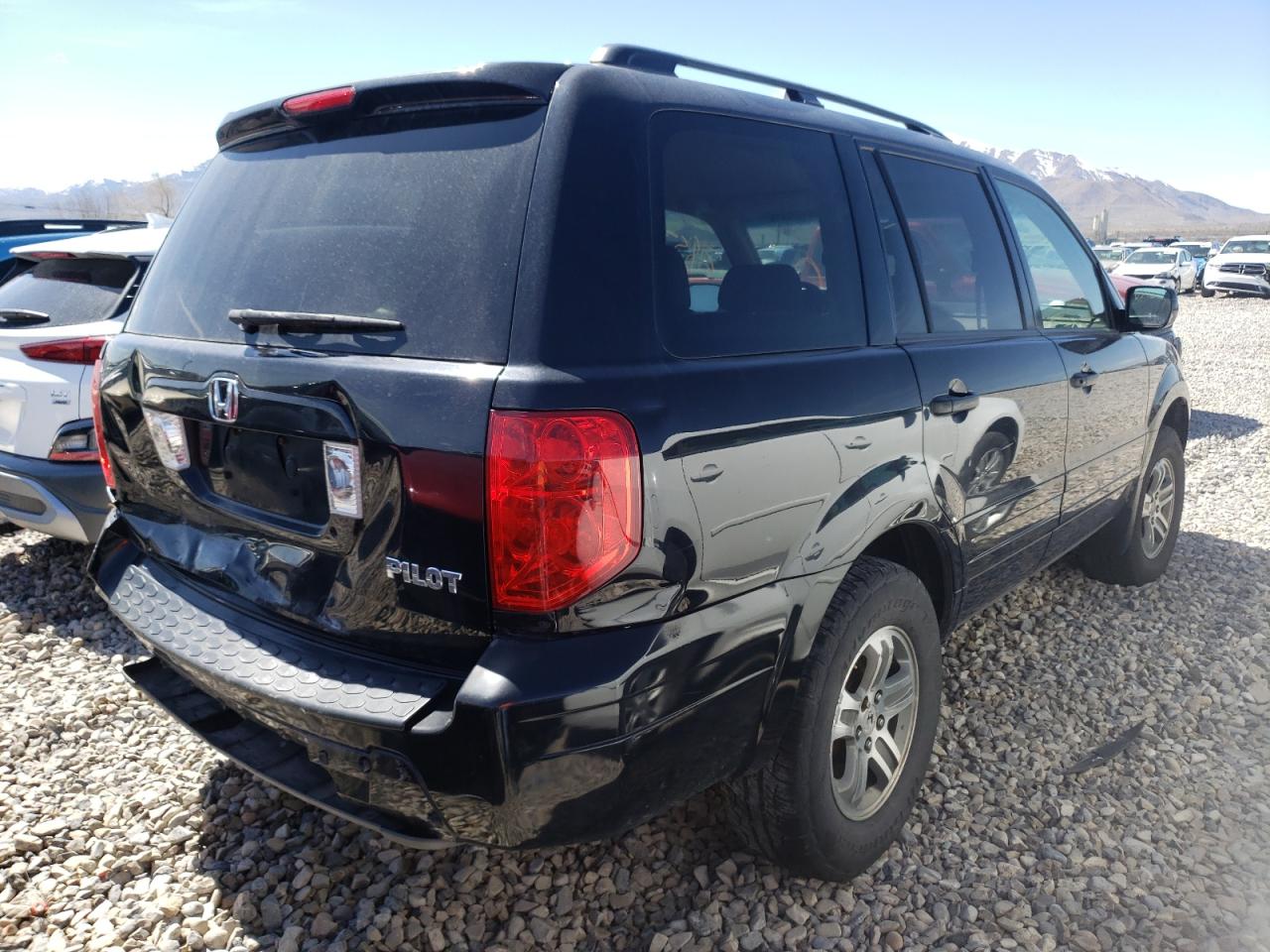 Photo 4 from auction – 2004 HONDA PILOT with VIN 2HKYF18754H593033