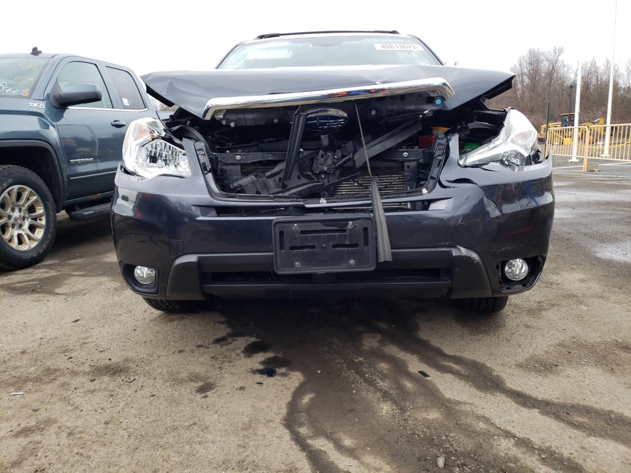 Photo 9 from auction – 2015 SUBARU FORESTER 2 with VIN JF2SJARC8FH538272