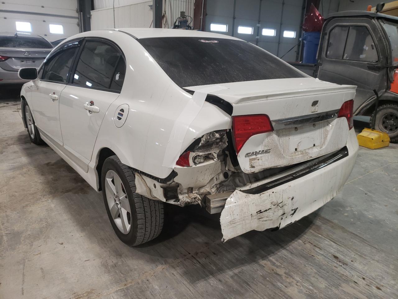 Photo 3 from auction – 2010 HONDA CIVIC with VIN 19XFA1F68AE017582