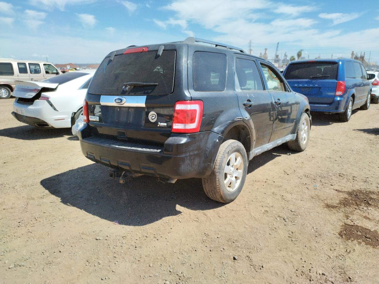 Photo 4 from auction – 2011 FORD ESCAPE LIM with VIN 1FMCU9EGXBKA33912