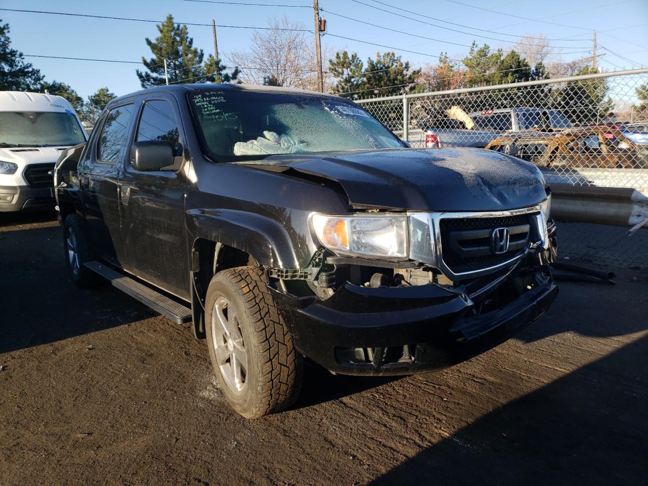 HONDA RIDGELINE 2011 with VIN 5FPYK1F27BB006501 - Photo from auction