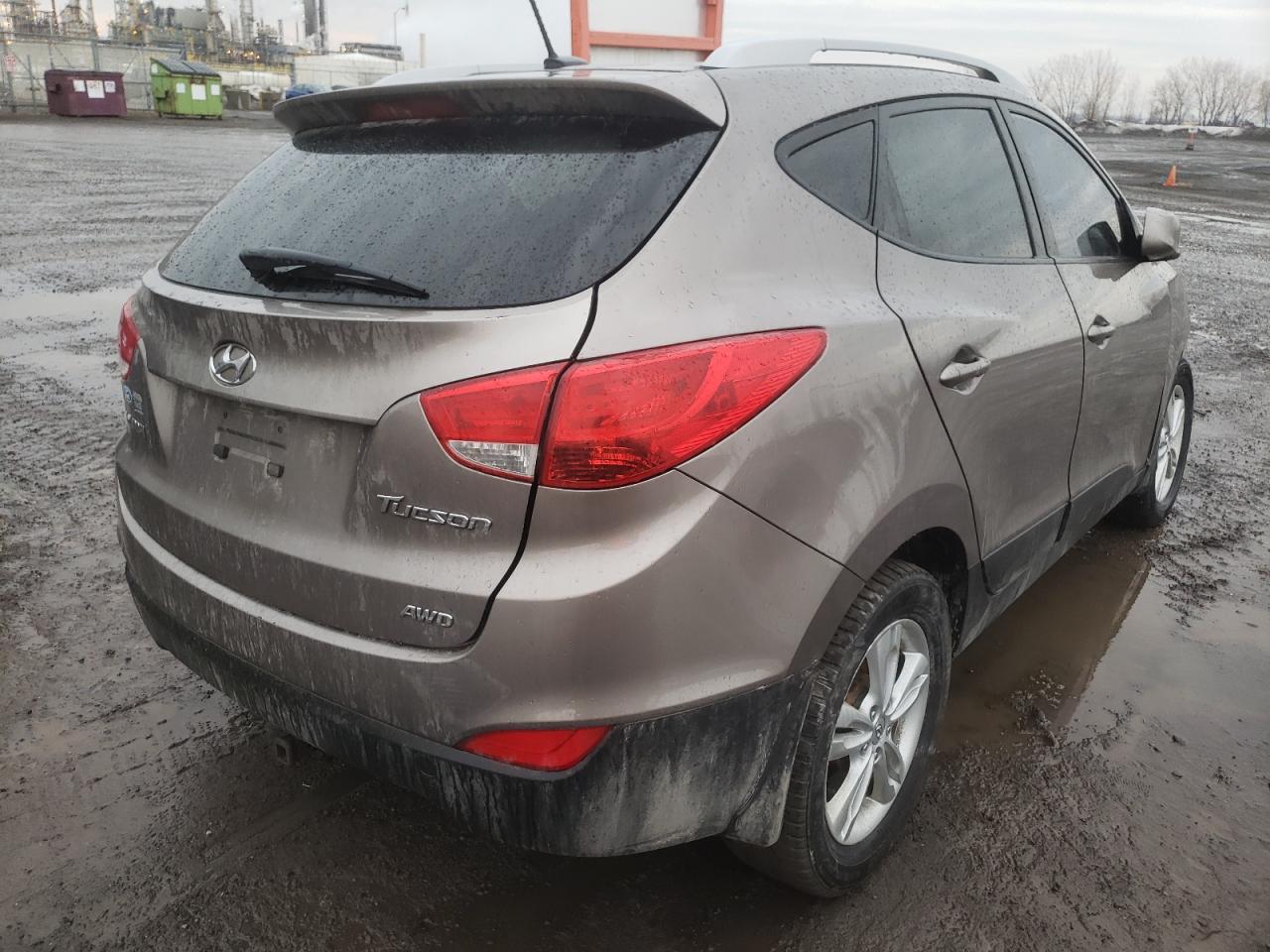 Photo 4 from auction – 2012 HYUNDAI TUCSON GLS with VIN KM8JUCAC4CU495539