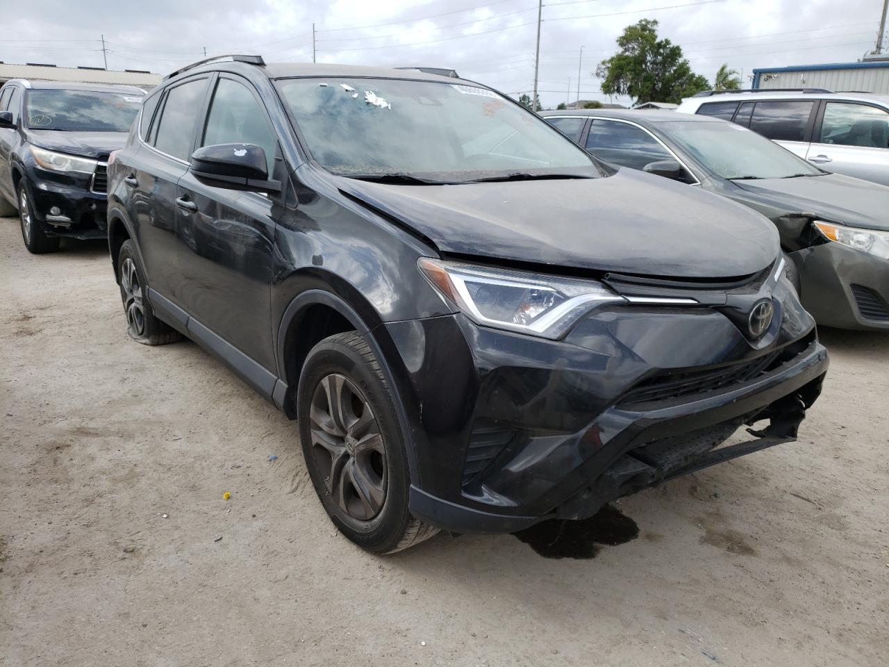 TOYOTA RAV4 LE 2018 with VIN 2T3ZFREV7JW490349 - Photo from auction