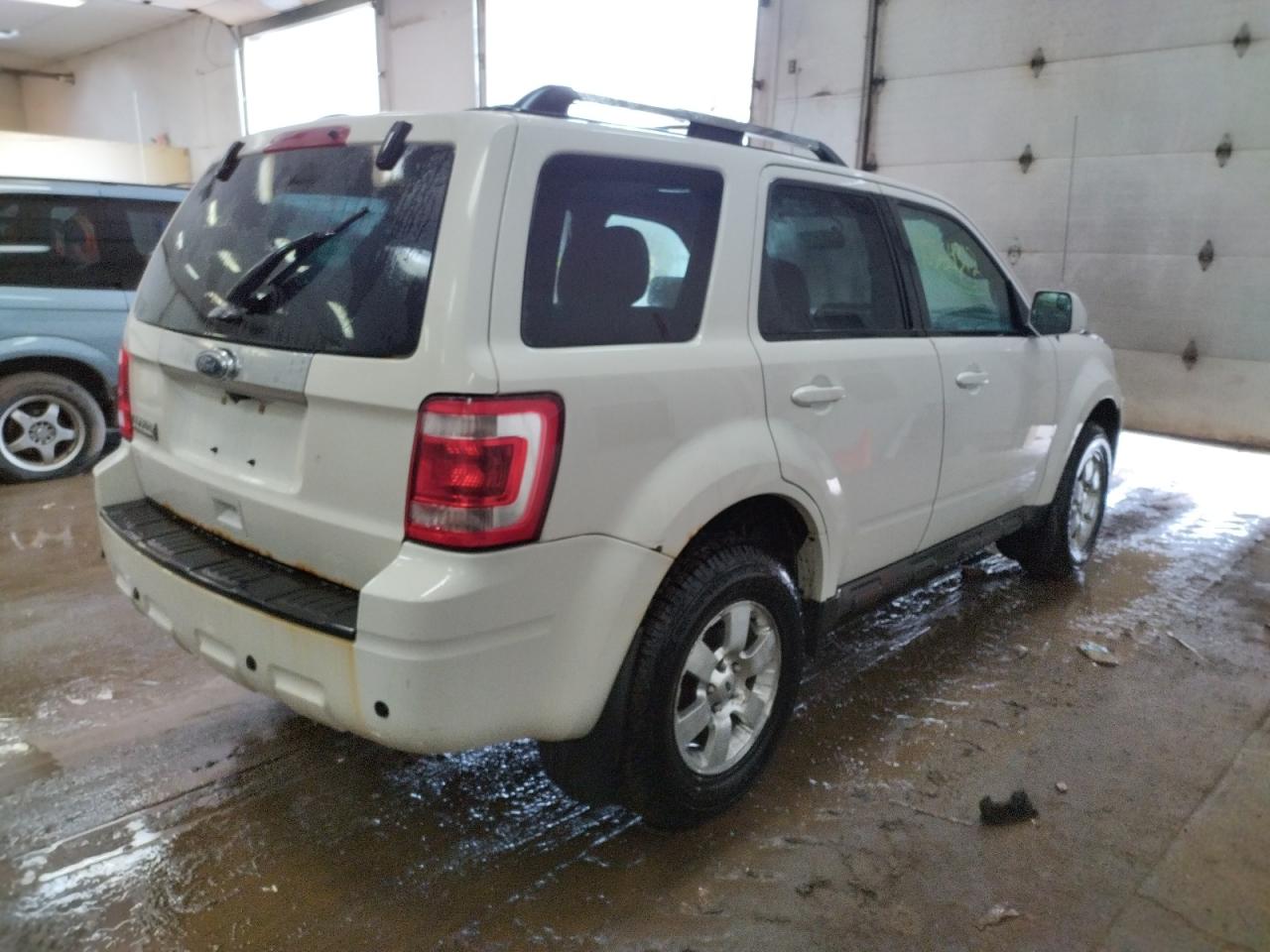 Photo 4 from auction – 2012 FORD ESCAPE LIM with VIN 1FMCU9E78CKC64972