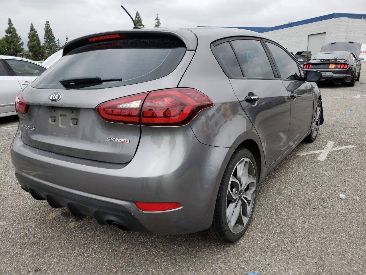Photo 4 from auction – 2016 KIA FORTE SX with VIN KNAFZ5A35G5590759