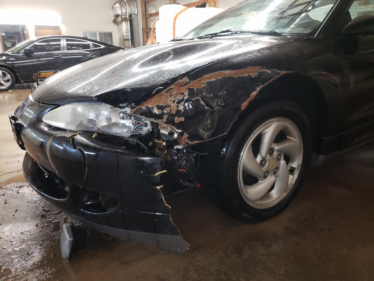 Photo 9 from auction – 1996 MITSUBISHI ECLIPSE GS with VIN 4A3AK54F9TE288972