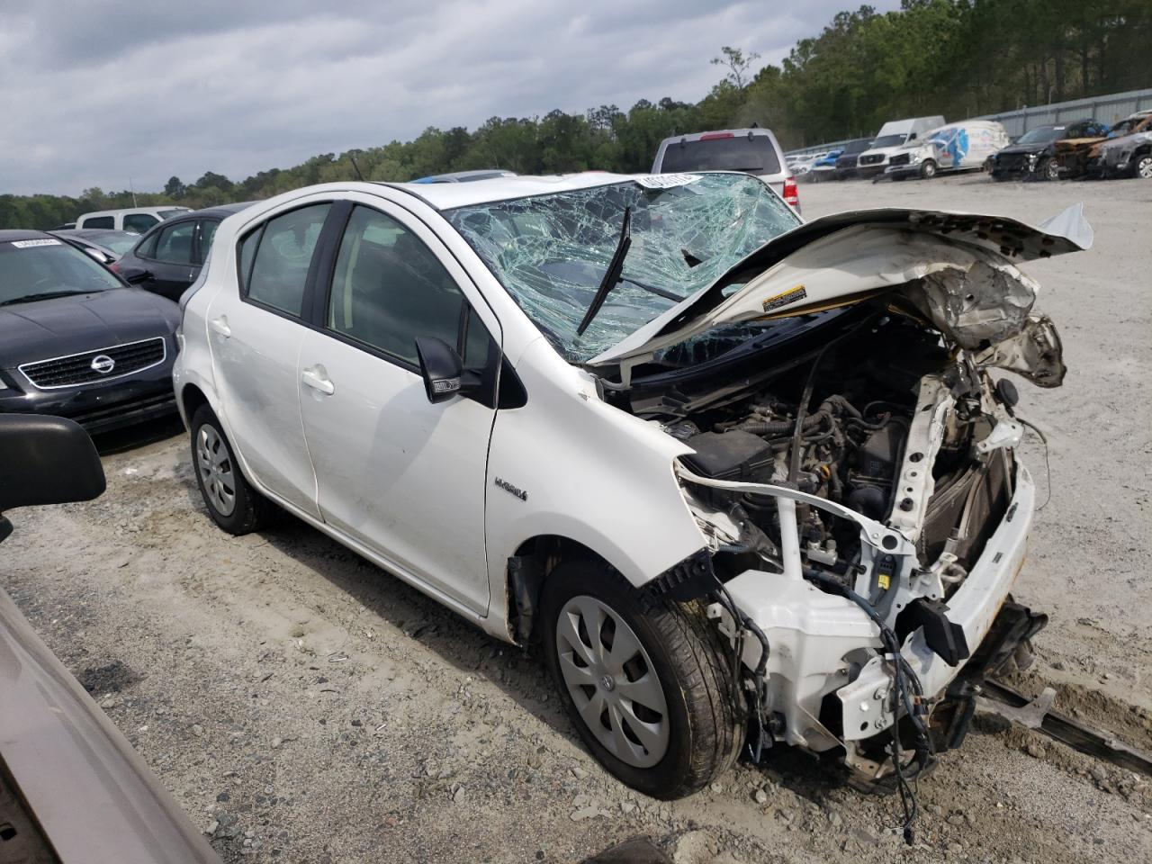 TOYOTA PRIUS C 2013 with VIN JTDKDTB32D1044099 - Photo from auction
