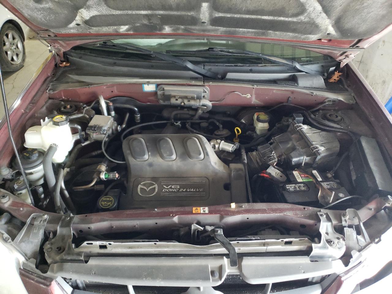 Photo 7 from auction – 2001 MAZDA TRIBUTE LX with VIN 4F2YU08131KM50509