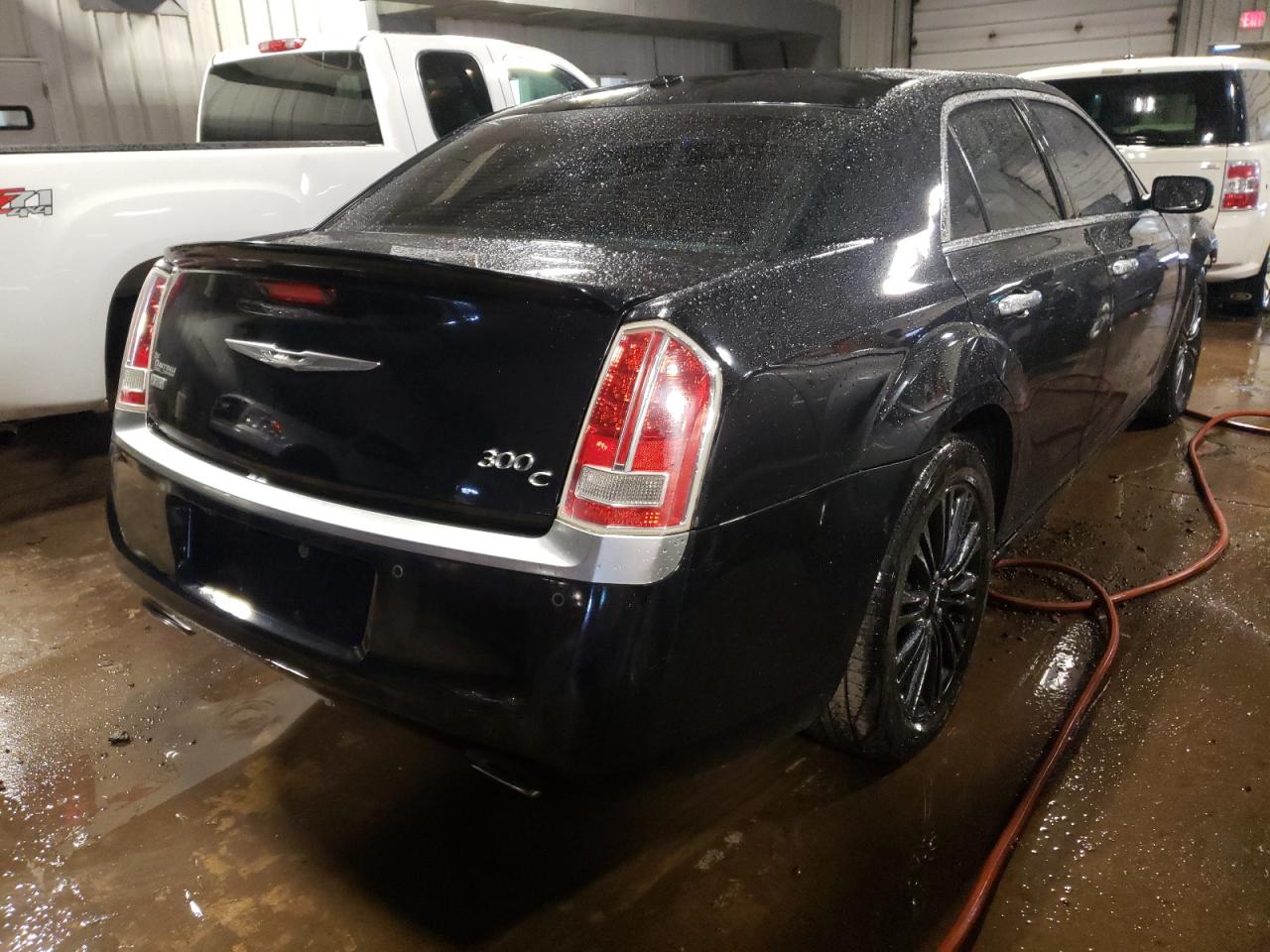 Photo 4 from auction – 2013 CHRYSLER 300C VARVA with VIN 2C3CCAJT0DH621957
