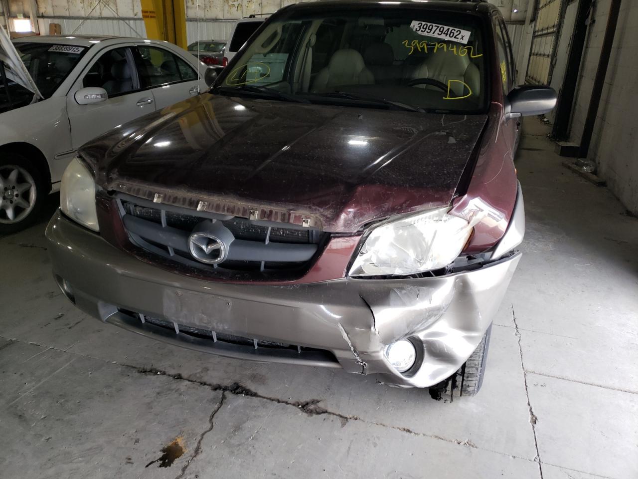 Photo 9 from auction – 2001 MAZDA TRIBUTE LX with VIN 4F2YU08131KM50509