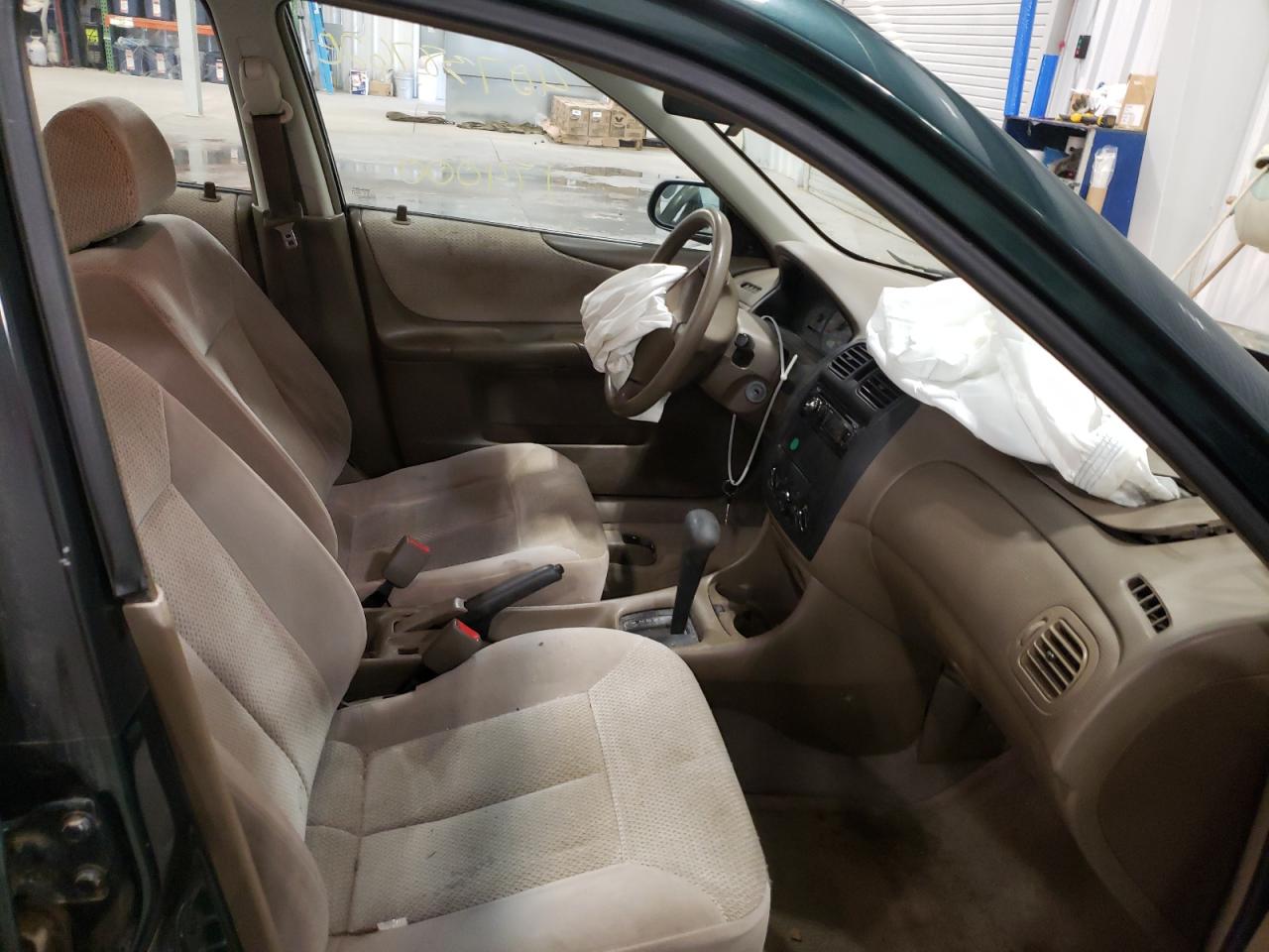 Photo 5 from auction – 1999 MAZDA PROTEGE DX with VIN JM1BJ2224X0160196