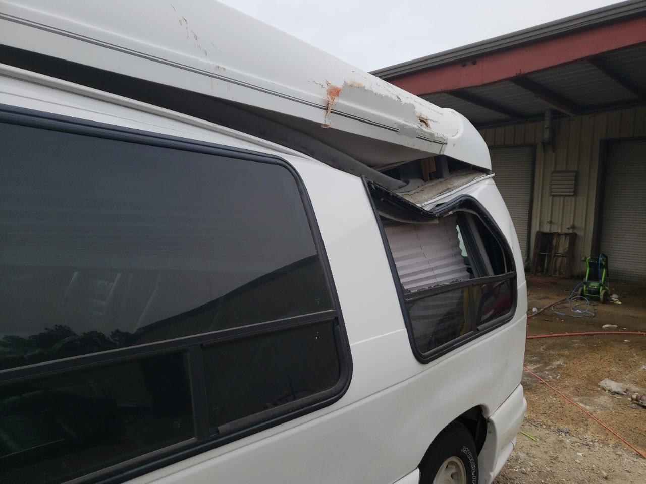 Photo 9 from auction – 1999 FORD ECONOLINE with VIN 1FDRE14WXXHB73965