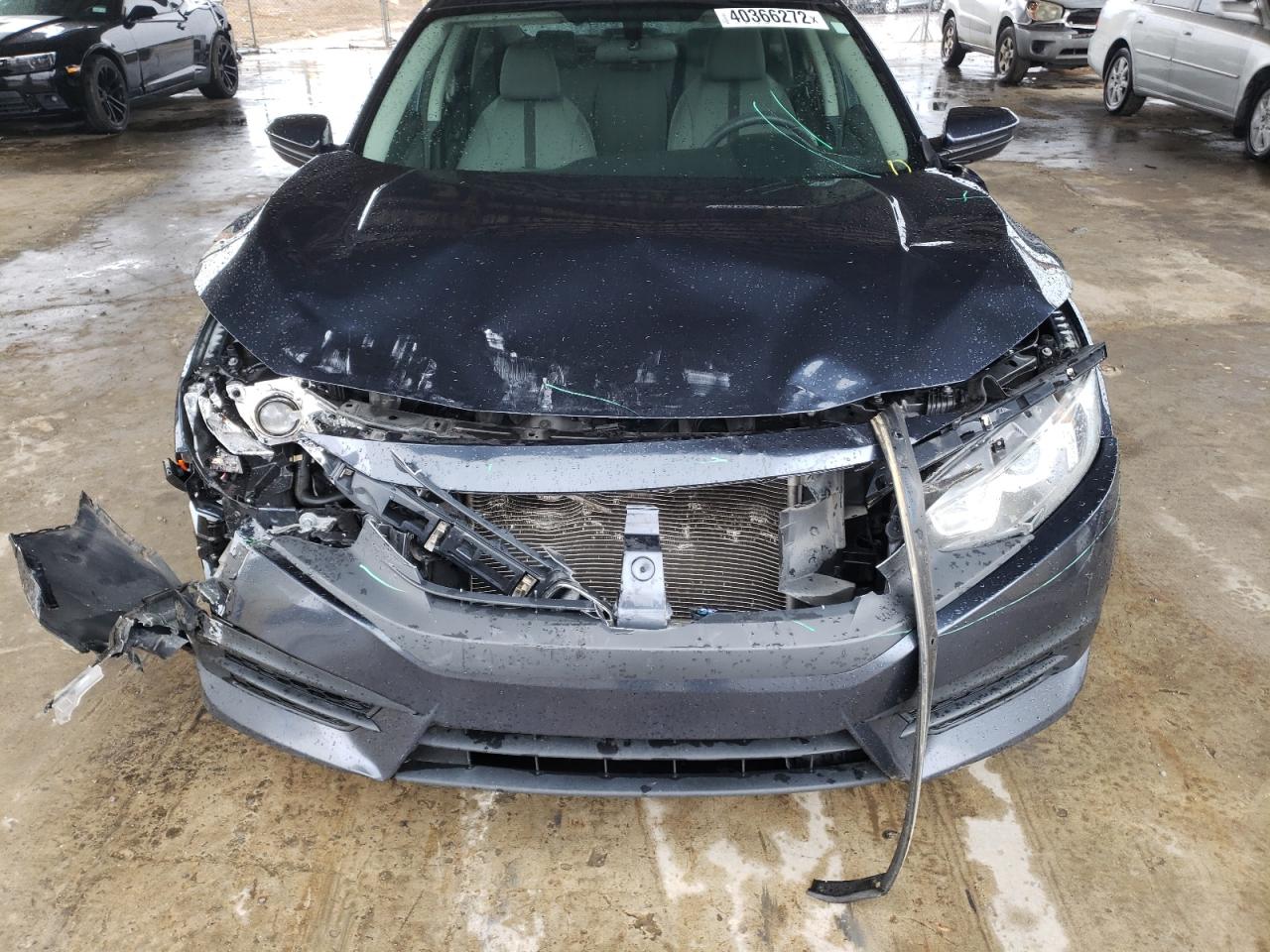 Photo 9 from auction – 2016 HONDA CIVIC LX with VIN 19XFC2F57GE041114