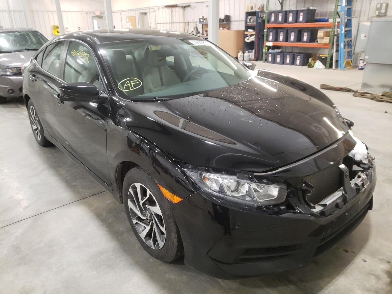 HONDA CIVIC EX 2017 with VIN 2HGFC2F72HH521439 - Photo from auction