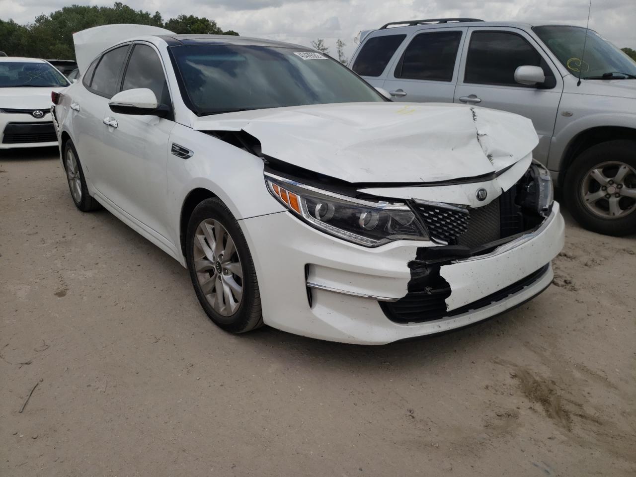 KIA OPTIMA EX 2016 with VIN 5XXGU4L32GG098831 - Photo from auction