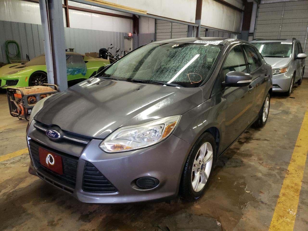 Foto 2 de la subasta – 2013 FORD FOCUS SE con VIN 1FADP3F21DL305461