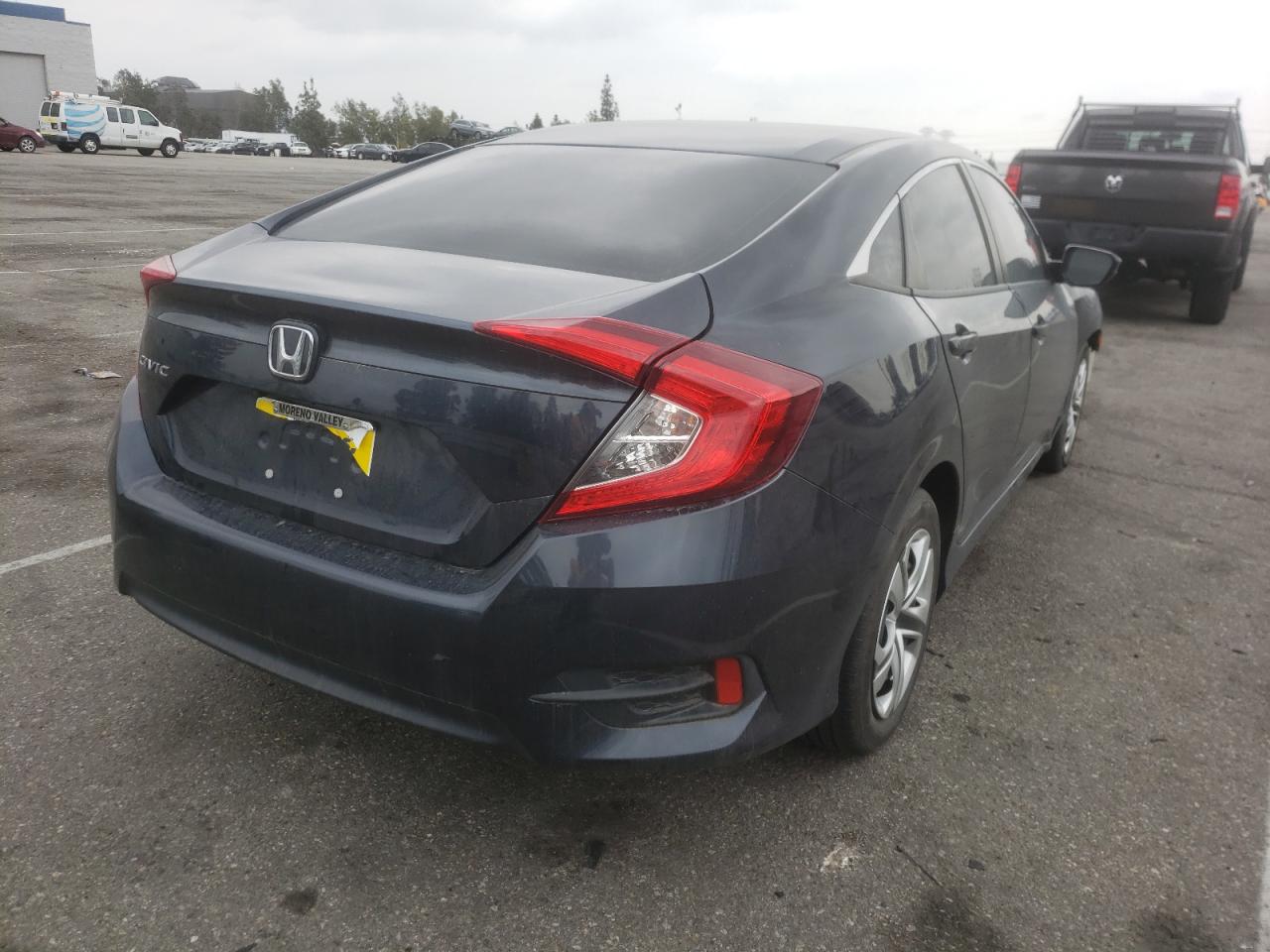 Photo 4 from auction – 2018 HONDA CIVIC LX with VIN 2HGFC2F55JH573121