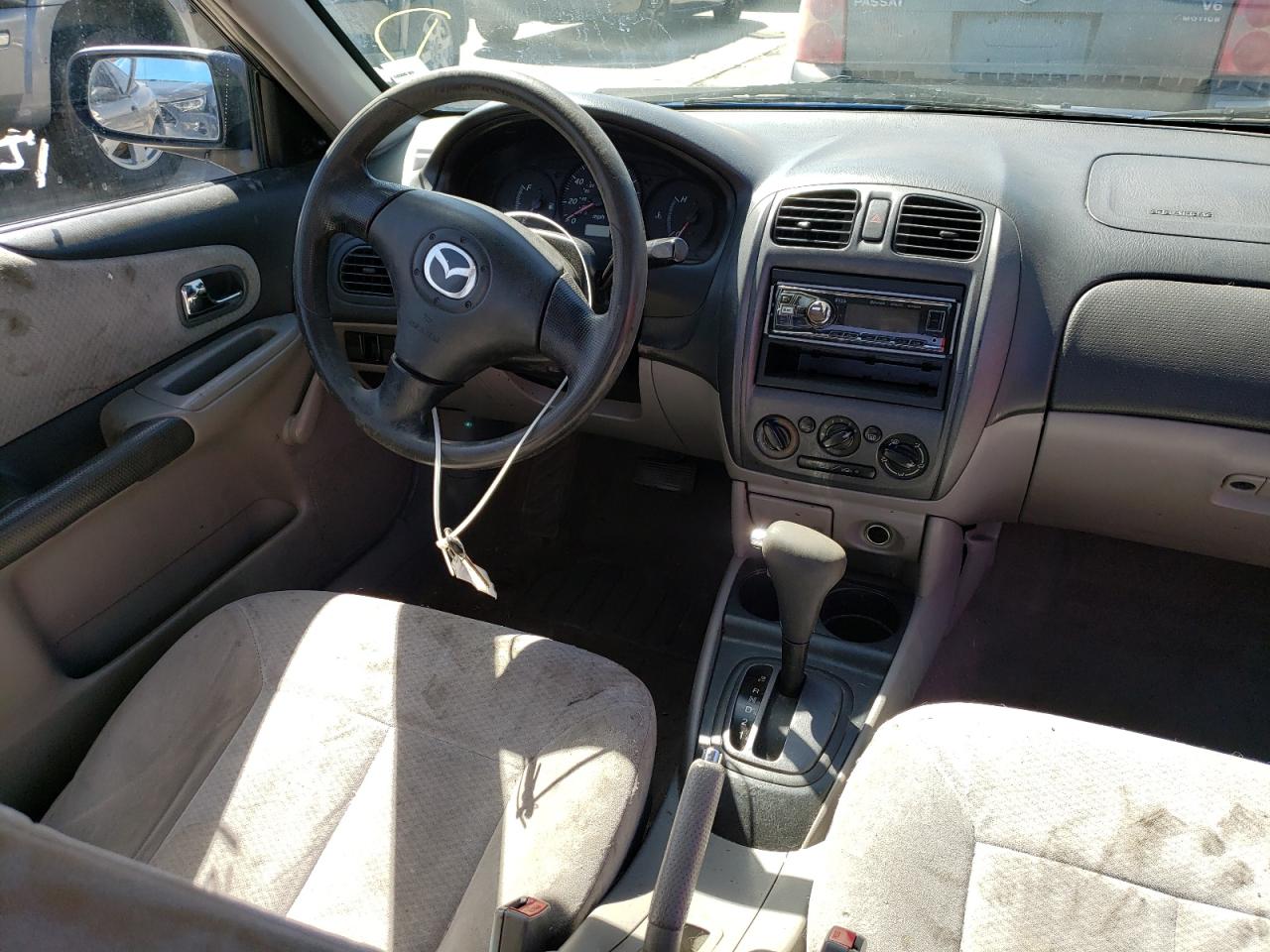 Photo 9 from auction – 2003 MAZDA PROTEGE DX with VIN JM1BJ225930167245