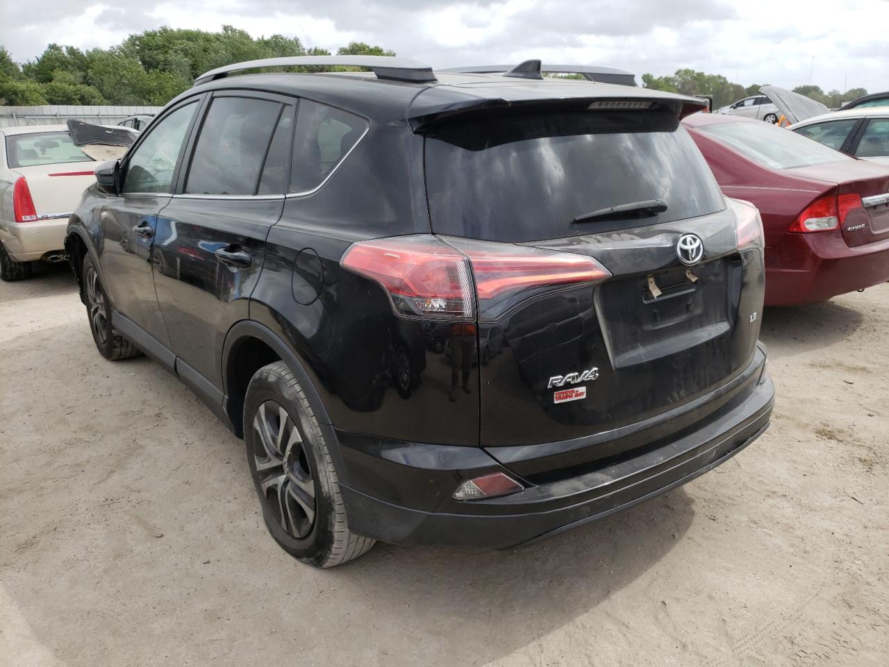 Photo 3 from auction – 2018 TOYOTA RAV4 LE with VIN 2T3ZFREV7JW490349
