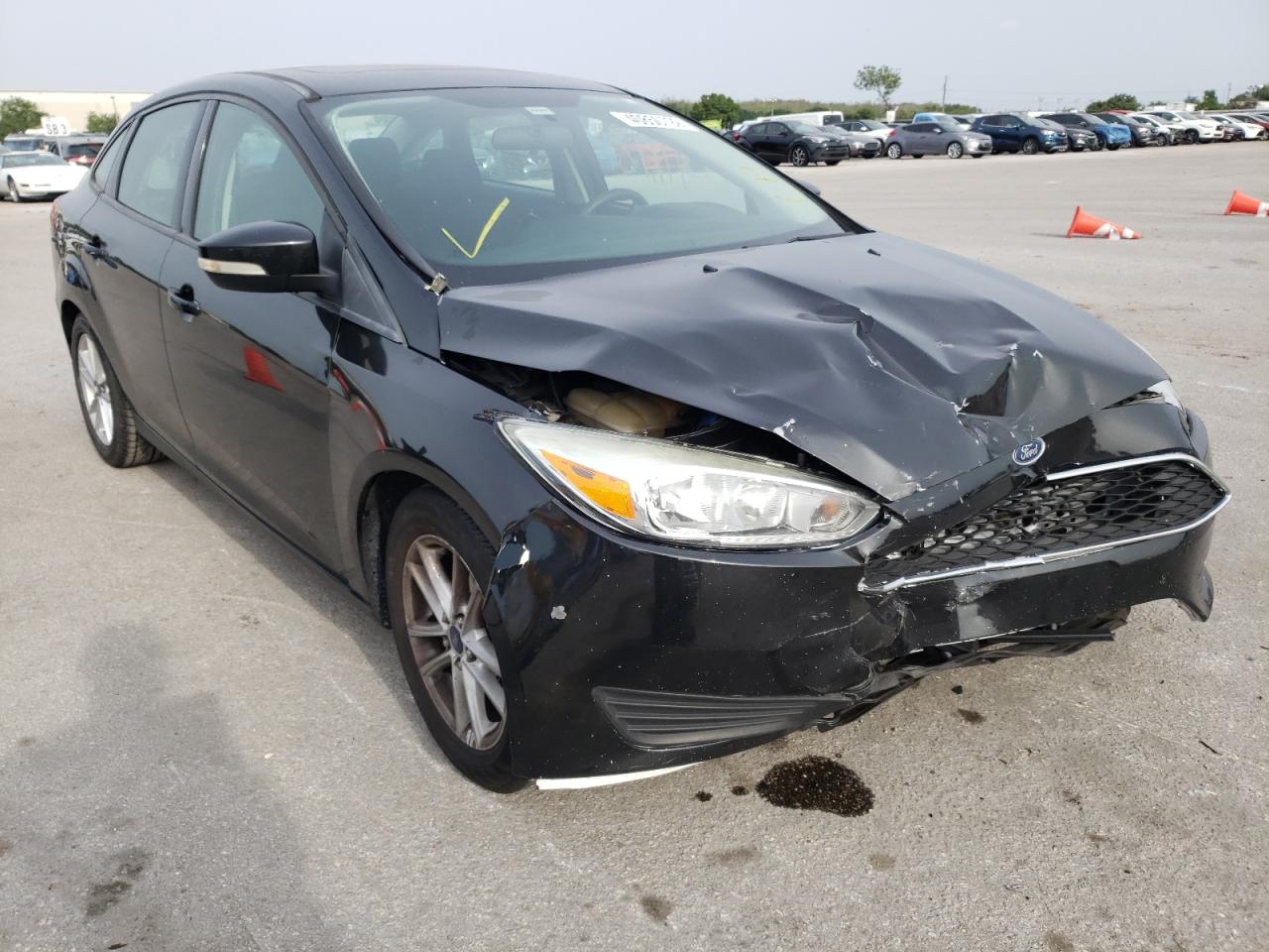 FORD FOCUS SE 2015 with VIN 1FADP3F28FL317237 - Photo from auction