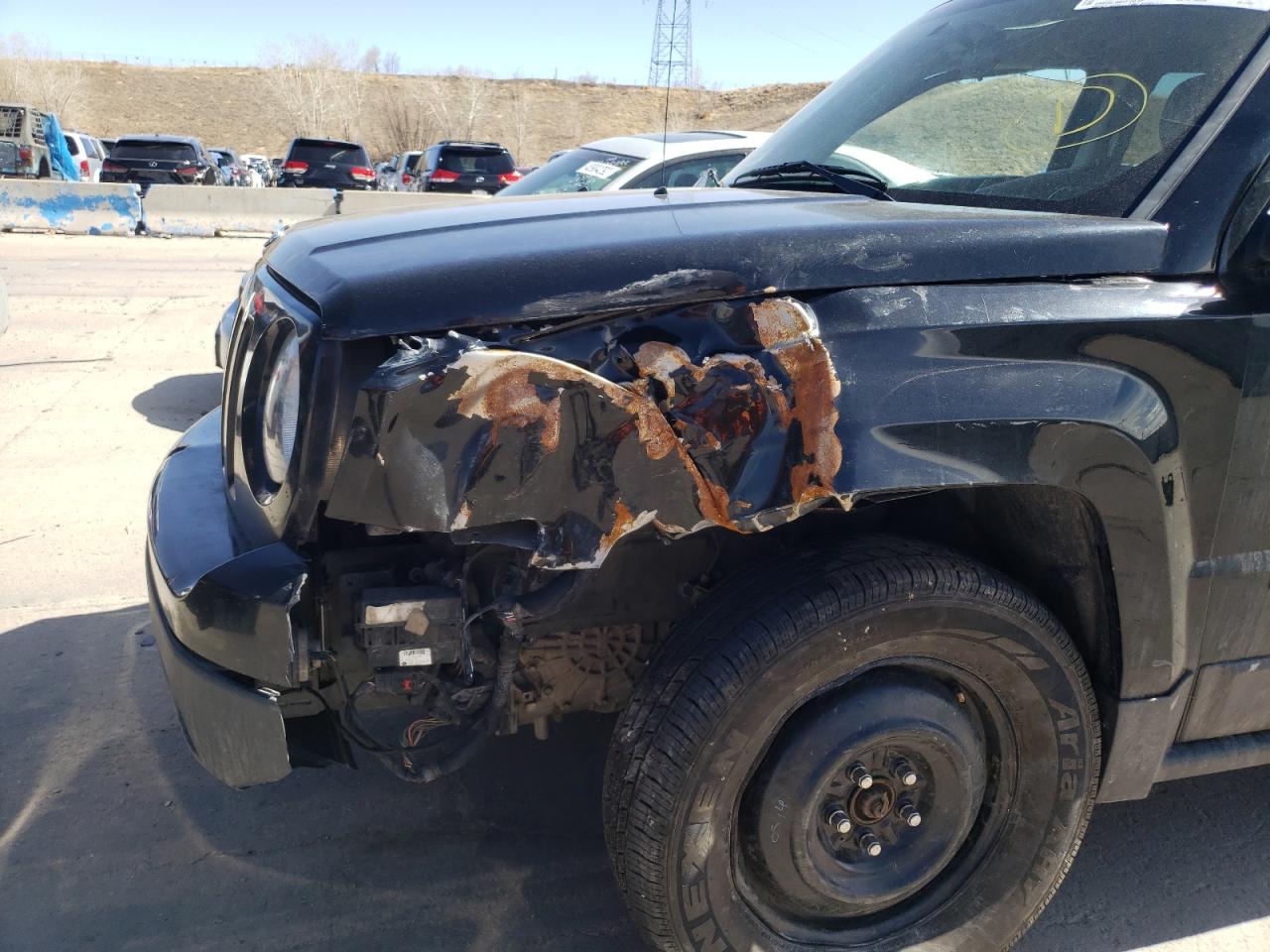 Photo 9 from auction – 2014 JEEP PATRIOT SP with VIN 1C4NJPBB0ED918647